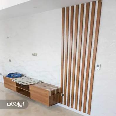 بازسازی و نقاشی ساختمان بهار